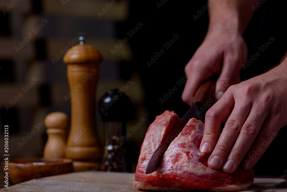 Butcher cuts beef