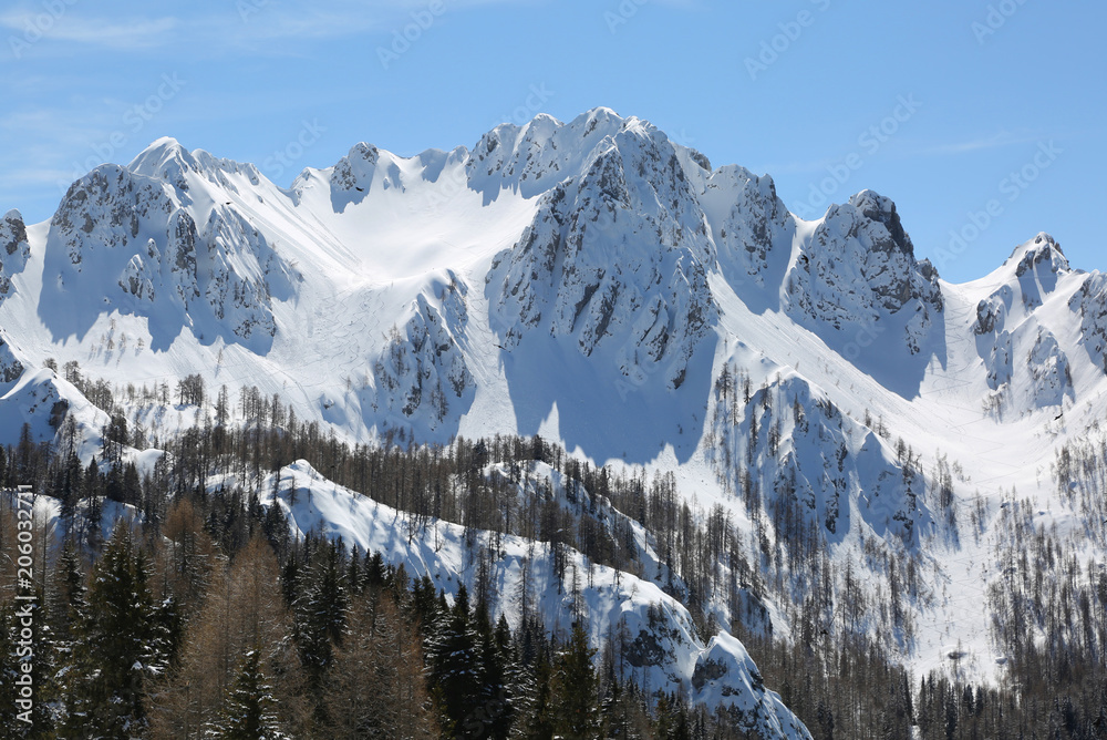 view of moutains with snow in winter from Lussari Mount in North
