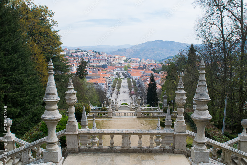 View down the staircase of Santuario de Nossa Senhora dos Remedios through the central avenue in the city of Lamego, Portugal