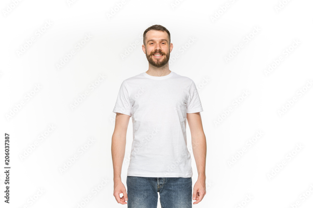 Closeup of young man's body in empty white t-shirt isolated on white background. Mock up for disign concept Closeup of young man's body in empty white t-shirt isolated on white background. Mock up for disign concept