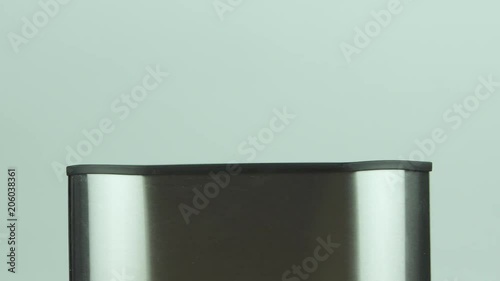 Preparation of healthy lifestyle breakfast toast of grain bread roasted in a toaster first raw and then ready slices shot on a colored background