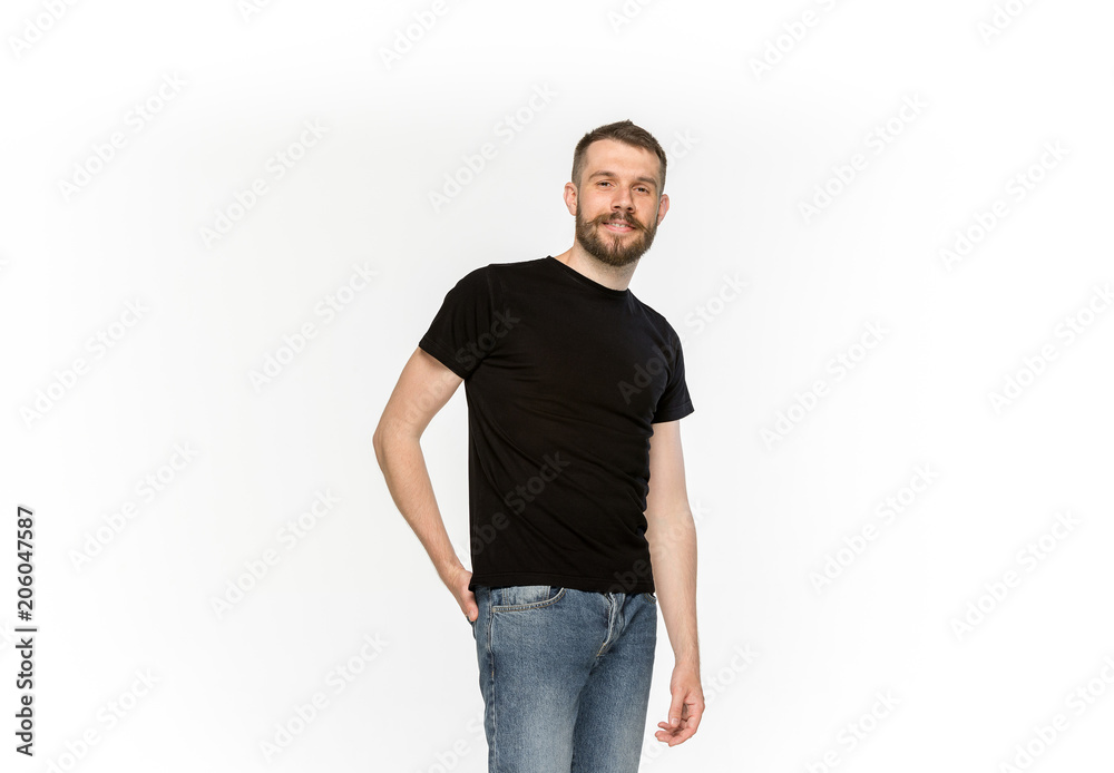 Closeup of young man's body in empty black t-shirt isolated on white background. Mock up for disign concept Closeup of young man's body in empty black t-shirt isolated on white background. Mock up for disign concept