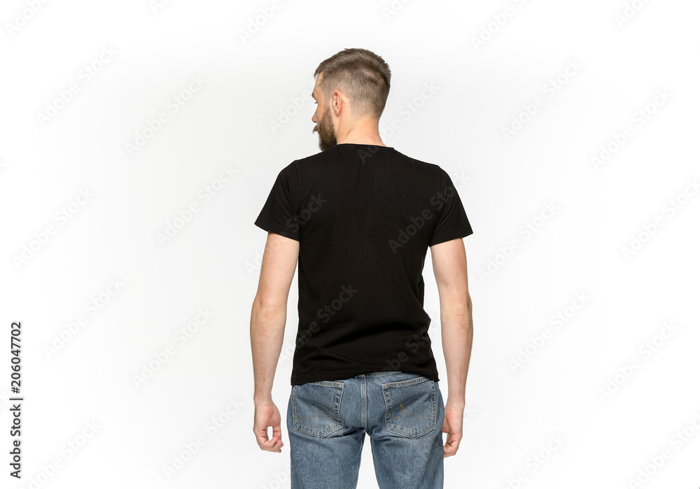 Closeup of young man's body in empty black t-shirt isolated on white background. Mock up for disign concept Closeup of young man's body in empty black t-shirt isolated on white background. Mock up for disign concept