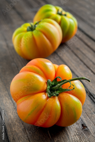 tomato marmande on wooden table
