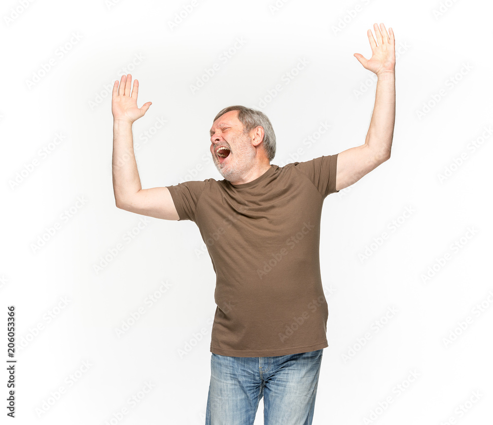Closeup of senior man's body in empty brown t-shirt isolated on white background. Mock up for disign concept Closeup of senior man's body in empty brown t-shirt isolated on white background. Mock up for disign concept