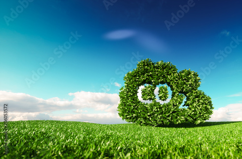 Carbon dioxide emissions control concept. 3d rendering of co2 cloud on fresh spring meadow with blue sky in background. photo