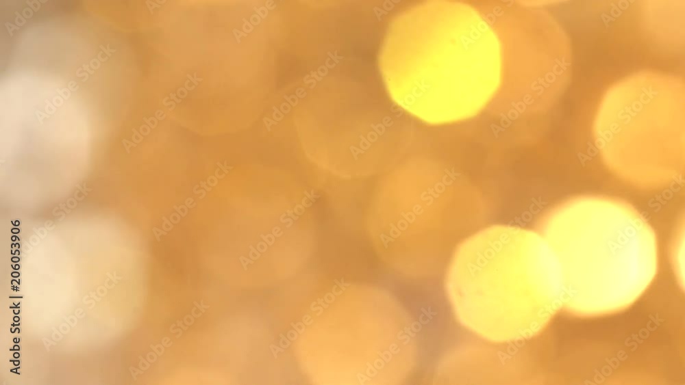 Abstract Gold bokeh lights in motion in 4k video. High quality render of gold particles. Ideal for Christmas, valentines day, wedding, love, celebration and party videos as background Abstract Gold bokeh lights in motion in 4k video. High quality render of gold particles. Ideal for Christmas, valentines day, wedding, love, celebration and party videos as background