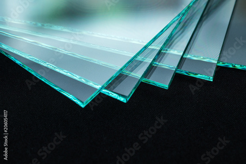 Sheets of Factory manufacturing tempered clear float glass panels cut to size photo
