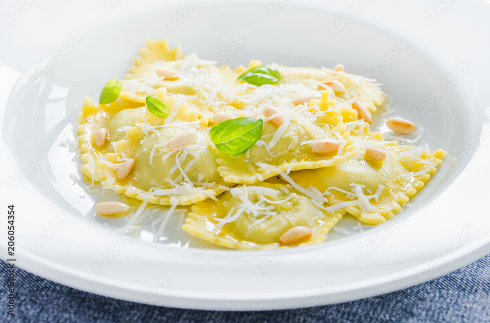 Ravioli ricotta and spinach with parmesan close up. Ravioli ricotta and spinach with parmesan close up.