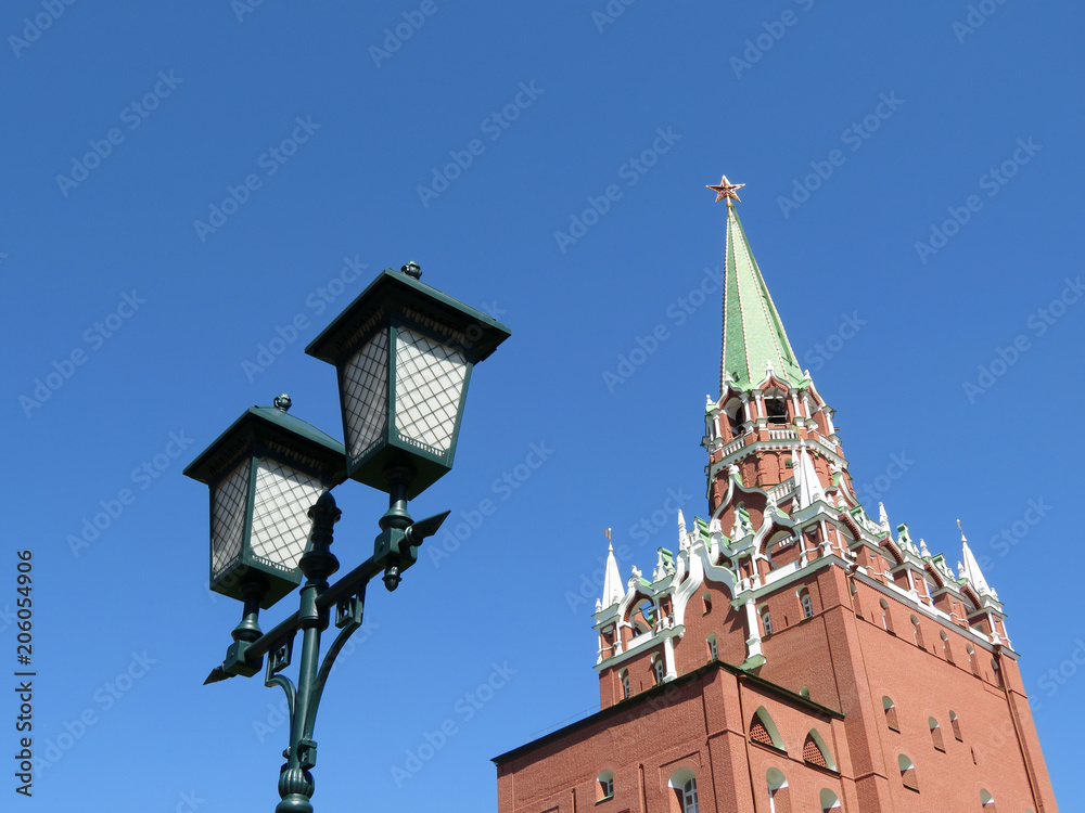 Troitskaya tower and vintage street light on the Moscow Kremlin territory. Russian architecture landmarks