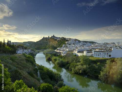 Early evening sunset light falling on the town of Arcos de La Frontera  Andalucia  Spain