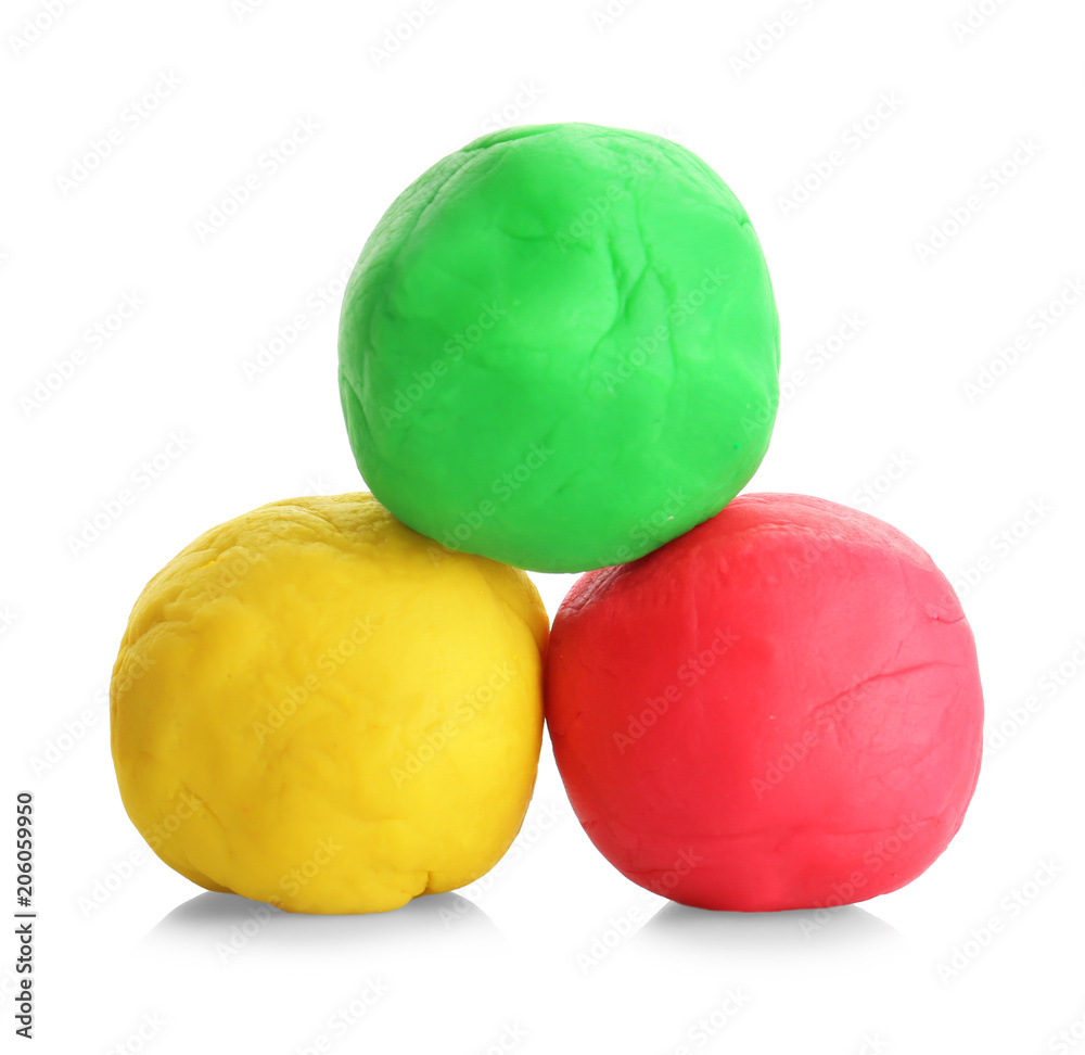 Colorful play dough on white background Colorful play dough on white background