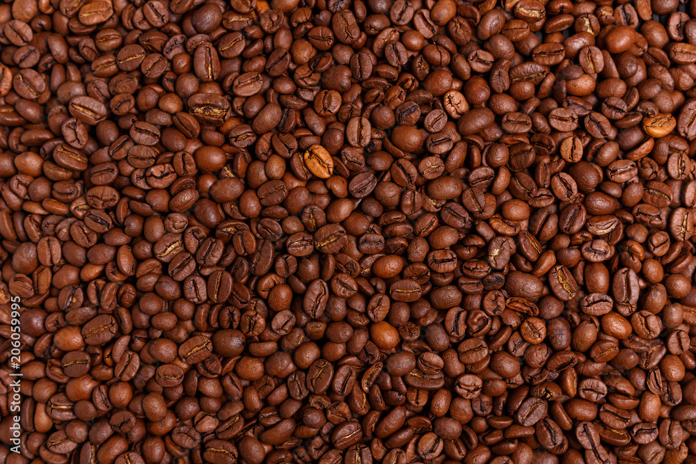coffee beans in jute bag on wooden table. Burlap sack full of coffee beans on wood table coffee beans in jute bag on wooden table. Burlap sack full of coffee beans on wood table