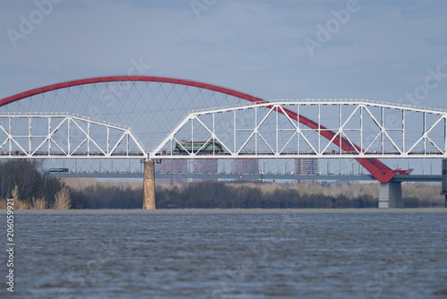 The train is traveling along the railway bridge