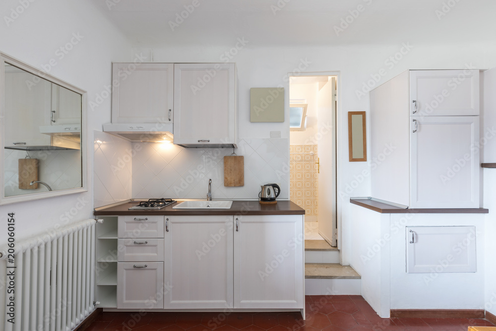 Kitchen of a small intimate and very cozy apartment. Kitchen of a small intimate and very cozy apartment.