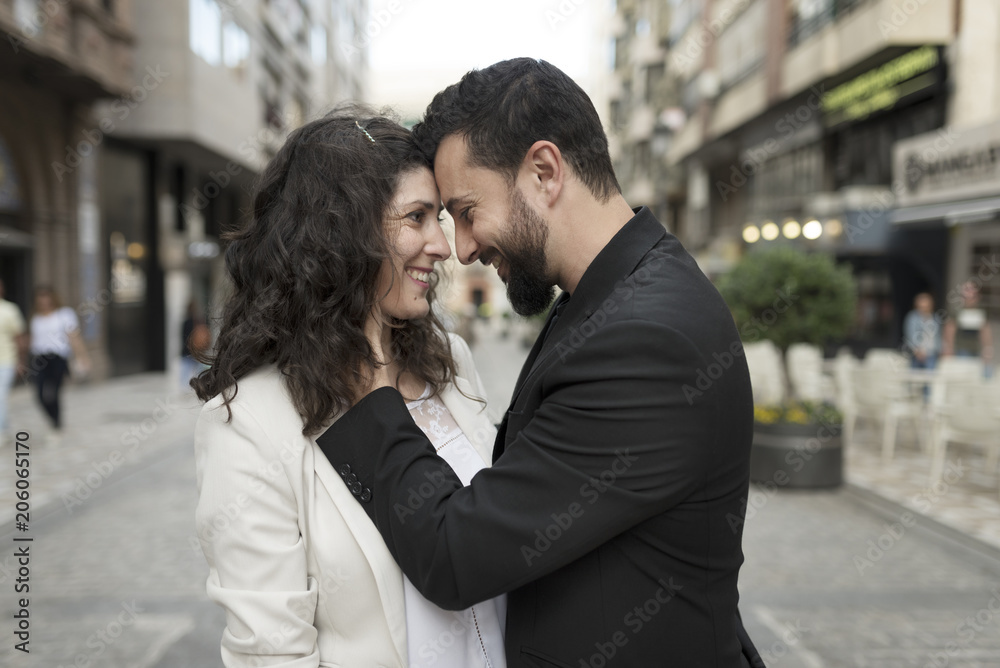 Couple in the street having love time, kiss and hug Couple in the street having love time, kiss and hug