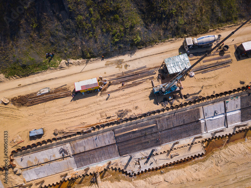 Construction site on the seashore aerial landscape, strengthening the Baltic Sea coastline, building a new promenade