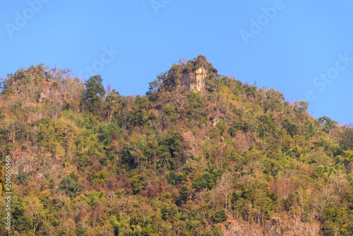 Extremely high mountain cliff for climbing.