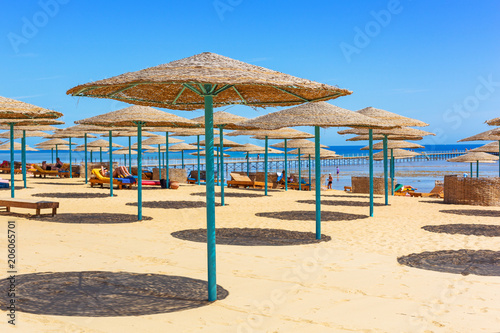 Parasols on the beach of Red Sea in Hurghada, Egypt