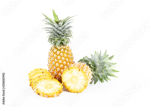 Fresh pineapple fruits sliced on white backgrounds