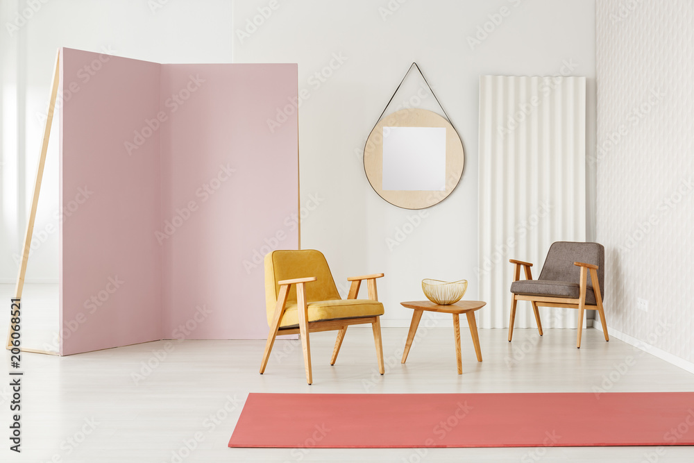 Fototapeta premium Spacious pink living room interior