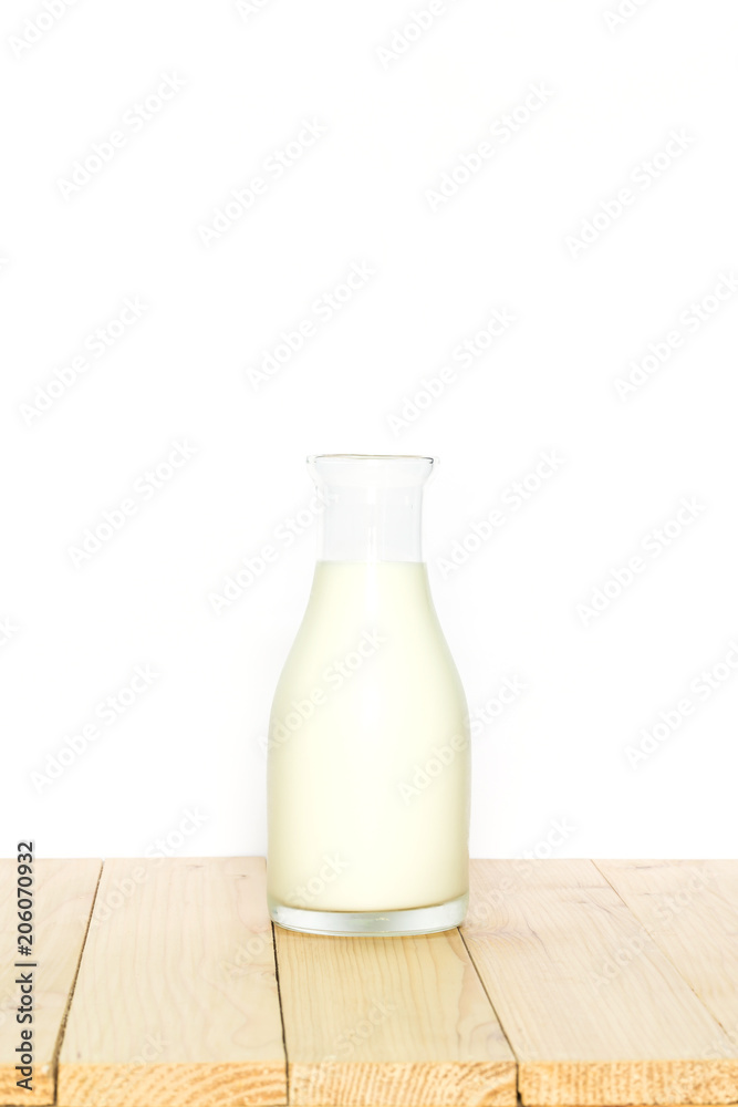 Milk bottle on white background