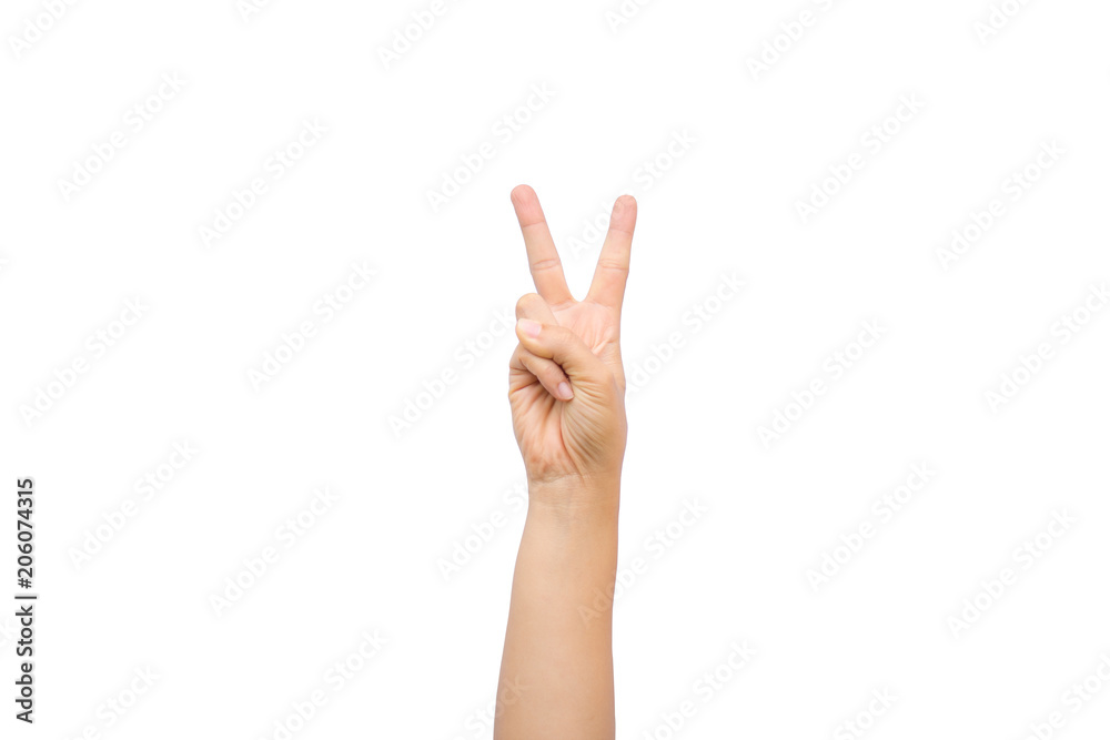 Woman hand showing two fingers as victory sign on white background Woman hand showing two fingers as victory sign on white background