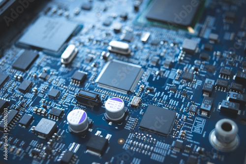 Computer board chip circuit cpu core blue technology background or texture with processors microelectronics hardware concept electronic device motherboard semiconductor