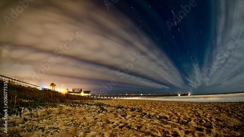 Long Exposure after dark of beach chair and pier