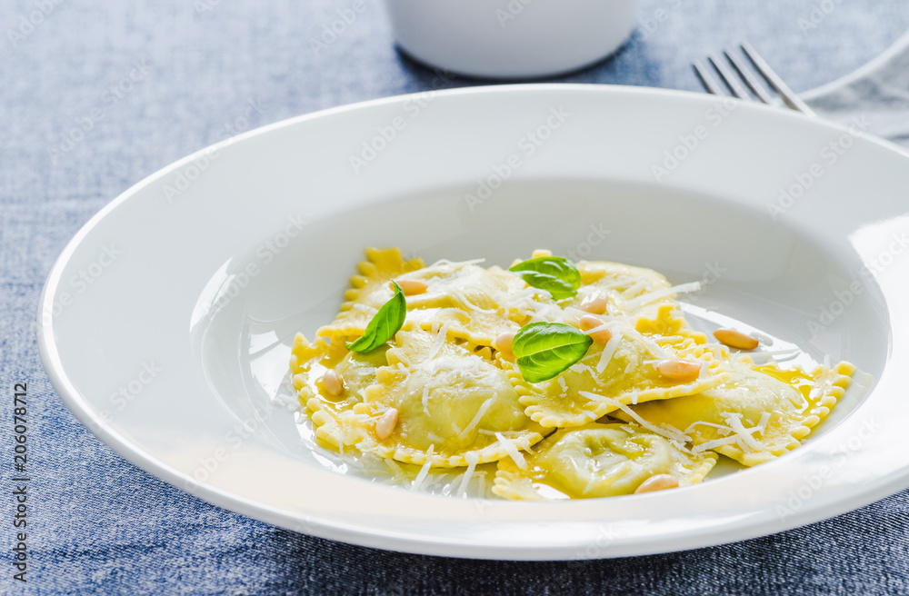 Ravioli with ricotta and spinach and parmesan.Italian traditional pasta dish.