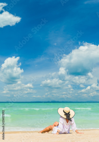 WOman alone on the beach in the Caribbean islands