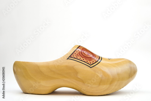 Dutch wooden clog isolated on the white background