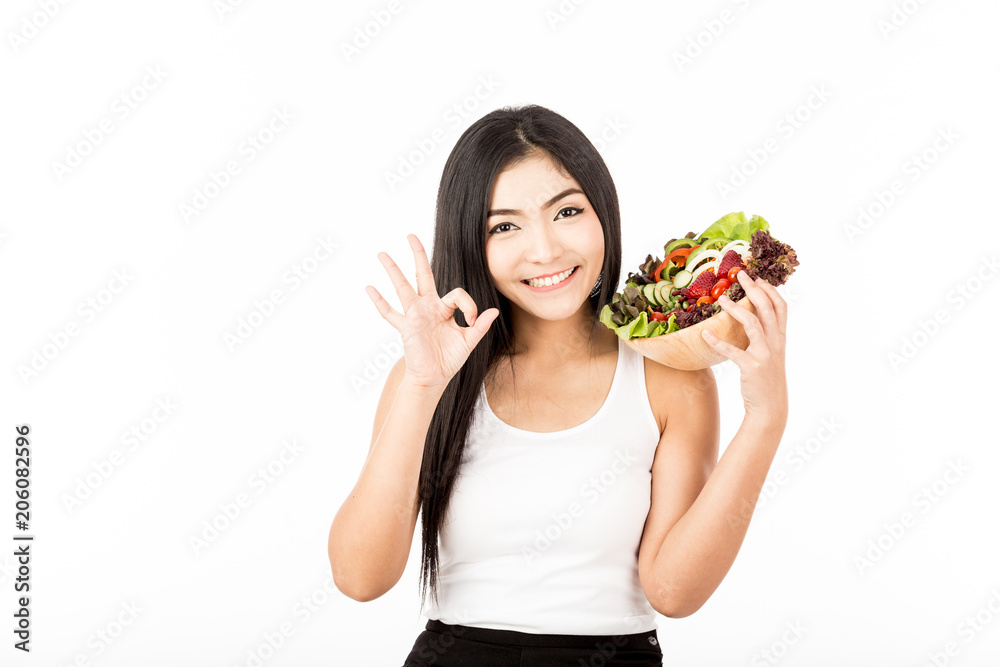 Beautiful Attractive Asian woman with black hair smile and holding fresh salad vegetable for good health feeling so happiness and Healthy,Isolated on white background,healthy Concept Beautiful Attractive Asian woman with black hair smile and holding fresh salad vegetable for good health feeling so happiness and Healthy,Isolated on white background,healthy Concept