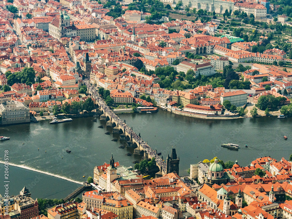 Aerial view of Charles Bridge and Old Town. View from the airship to the Charles Bridge in Prague. Panoramic view from airplane.