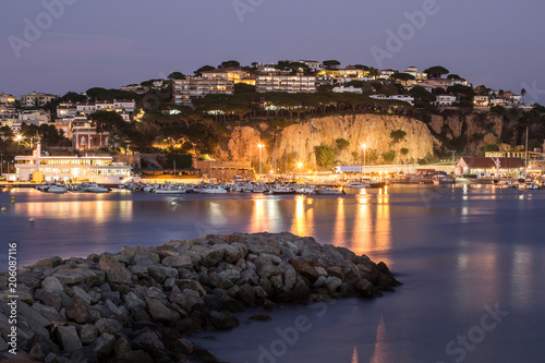 Night landscape of Sant Feliu de Guixols bay in Costa Brava, Spain.