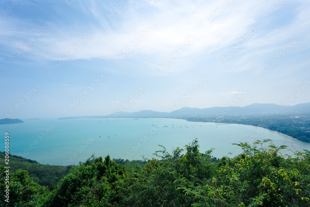 Sky and sea view over Phuket like a ring scape with forest in foreground