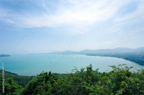Sky and sea view over Phuket like a ring scape with forest in foreground © TeeRaiden