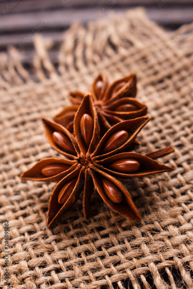 anise stars on a dark rustic background anise stars on a dark rustic background
