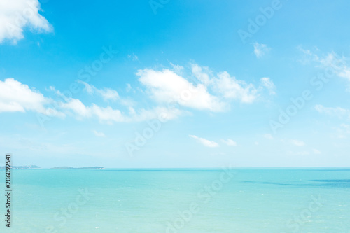Beautiful white clouds on blue sky over calm sea background.