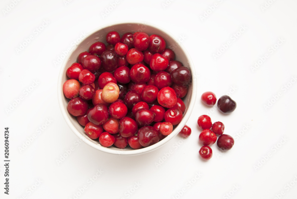 Cherries. Cherry. Cherries in bowl and kitchen napkin. Red cherry. Fresh cherries. Cherry on white background. healthy food concept Cherries. Cherry. Cherries in bowl and kitchen napkin. Red cherry. Fresh cherries. Cherry on white background. healthy food concept