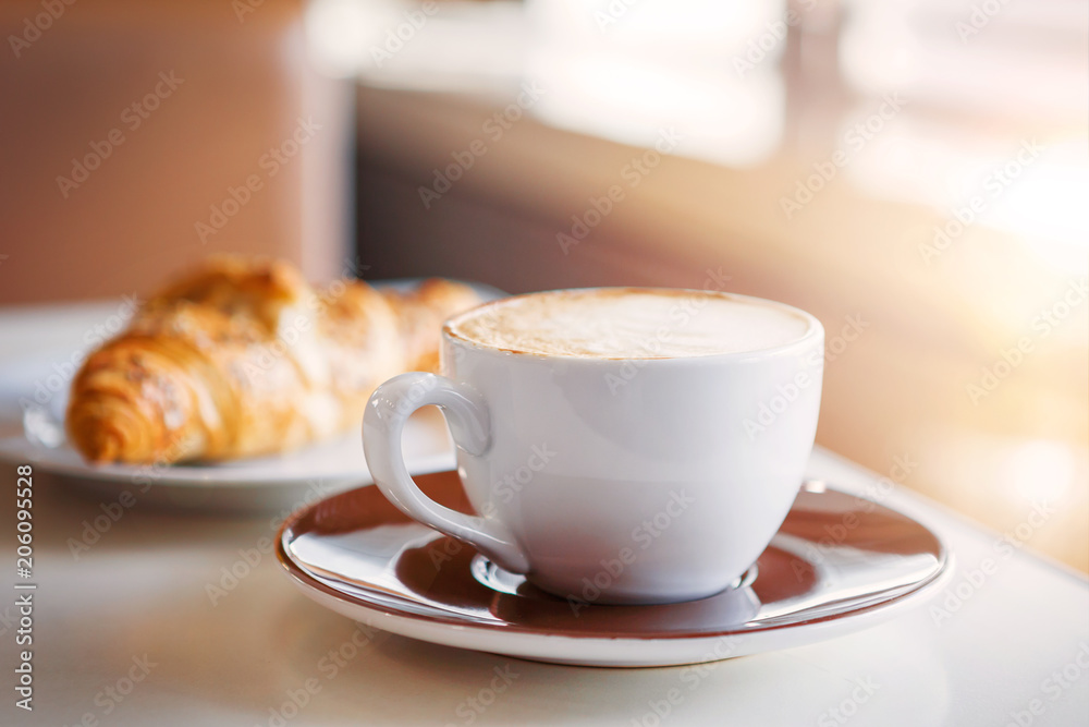 Cup of coffee with milk Cup of coffee with milk