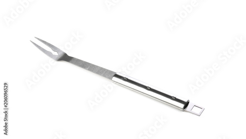 New metal barbecue fork on white background © New Africa