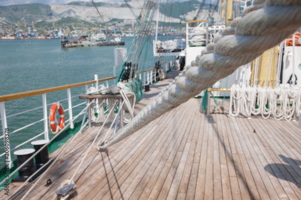 Ropes and Cleats on the Bow of a Wooden Sailboat