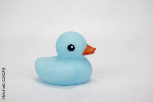 A blue rubber duck on an isolated white background 