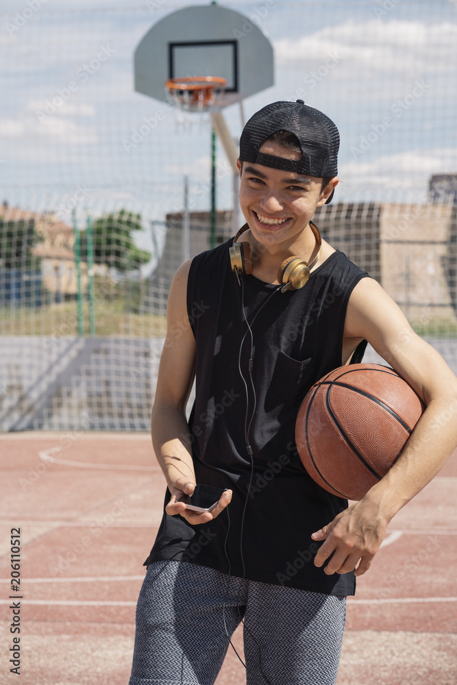 Naklejka premium Handsome boy Using a Mobile Phone.