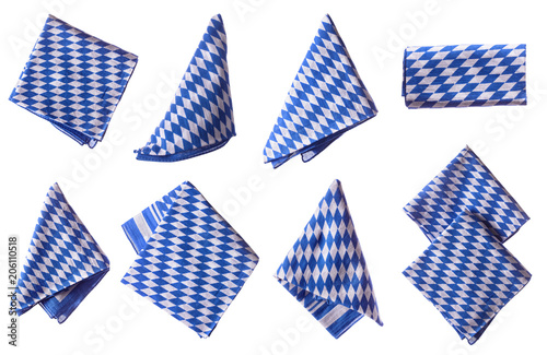 Bavarian white and blue napkin set. Oktoberfest items isolated.