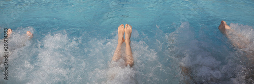 legs during the whirlpool therapy in the pool