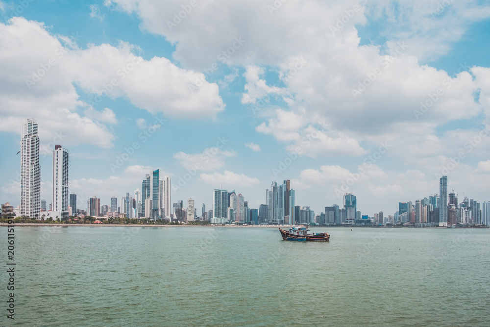 fisher boat with modern skyscraper city skyline background - Panama City 