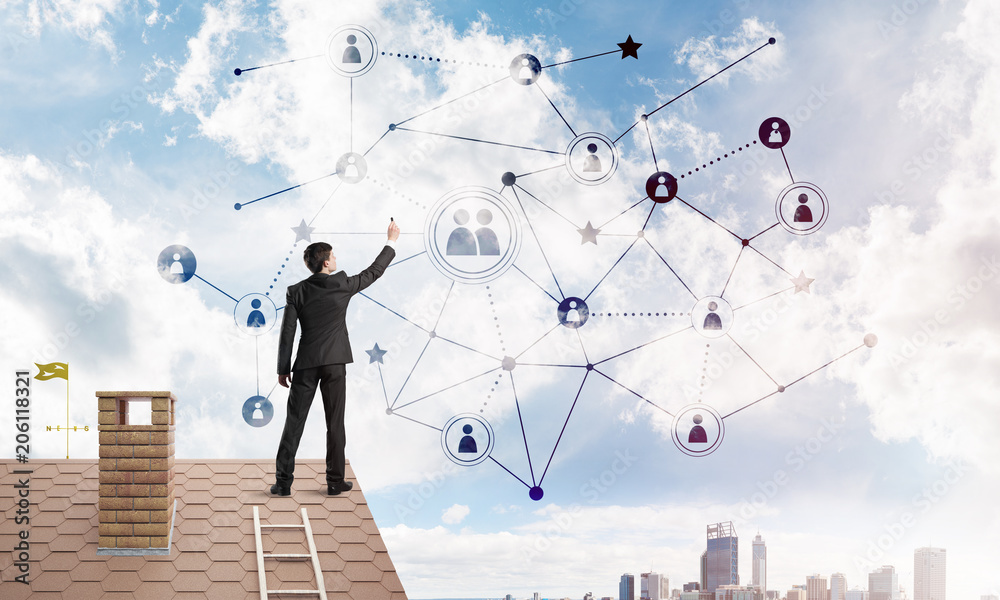 Businessman on house roof presenting networking and connection concept. Mixed media