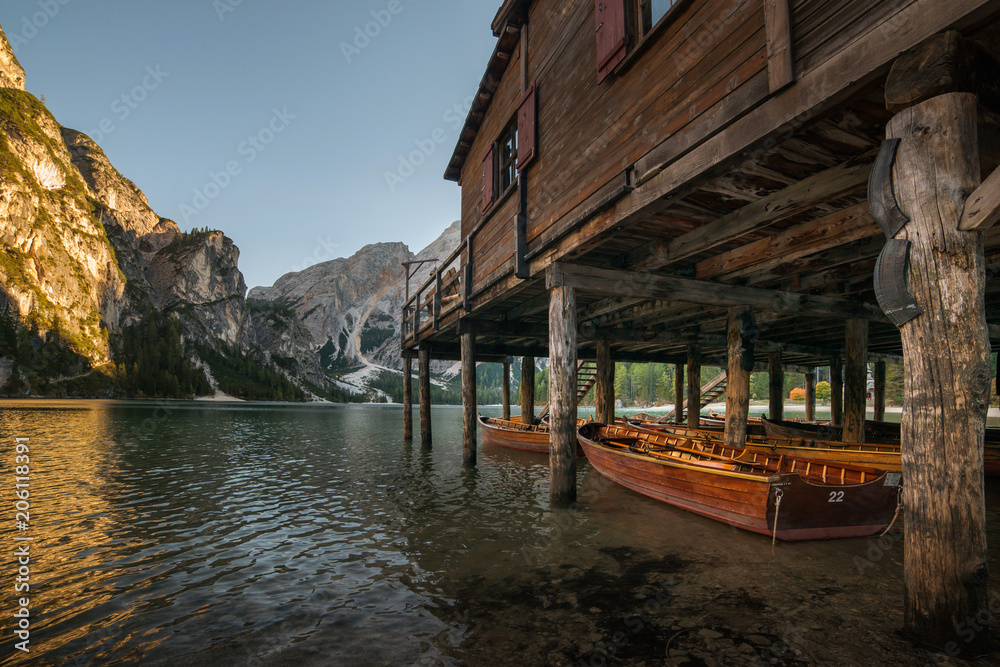Obraz premium photo of Lake Braies (Lago di Braies) in Dolomites Mountains, Italy. Hiking travel and adventure.